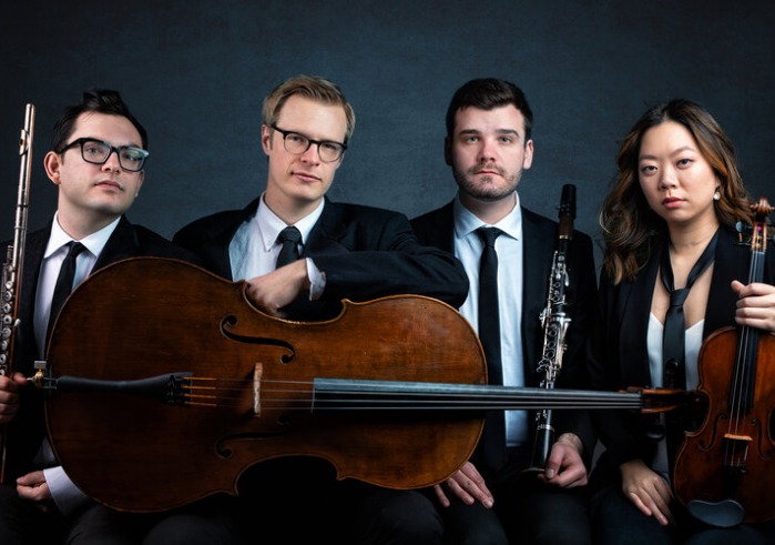 ensemble with 3 men and one woman