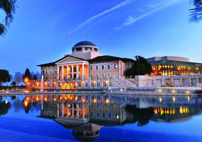 Founders Hall and Peace Lake calm and blue