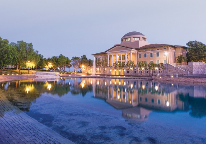 Overlooking Peace Lake at twilight with Founders Hall in the background