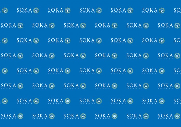 Soka University logo on blue background