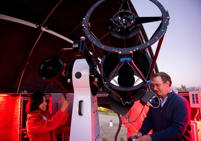 Student and professor operate telescope in Nieves Observatory