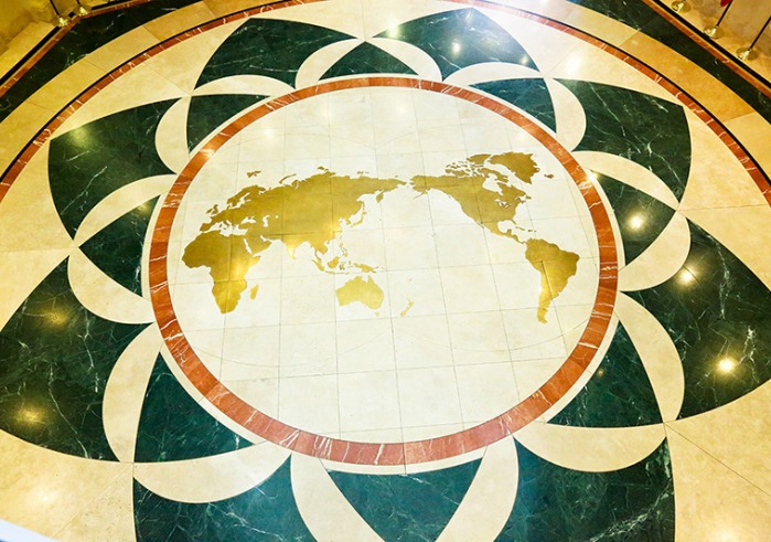 Inverted world map on the floor of Founders Hall atrium