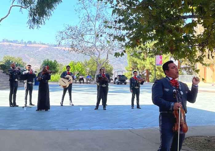 Arcoiris Mariachi Band performs outside on SUA's Campus in honor of Latine Heritage and LGBT History Months
