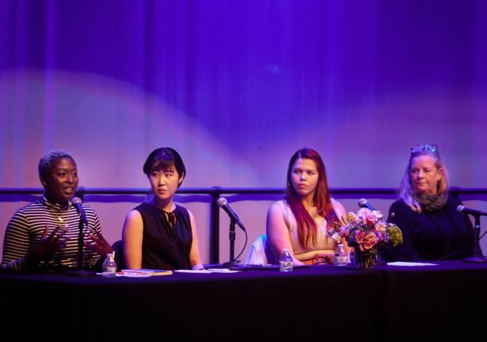 Anne Pearce, director of the creative arts program, Soka alumnus Giselle Velasquez ’15, Nappa Kataoka ’23, and Wilnie Merilien, resident hall coordinator sit on stage and speak during the “Voices of Women at Soka” event.