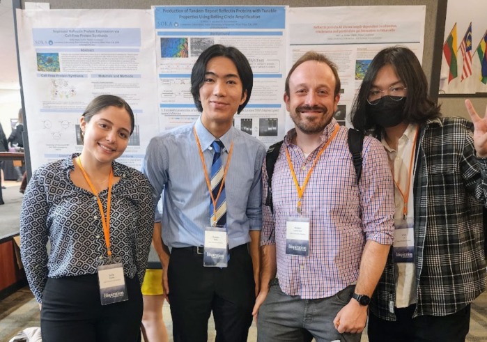 Prof Robert Levenson poses with three Soka Undergraduates