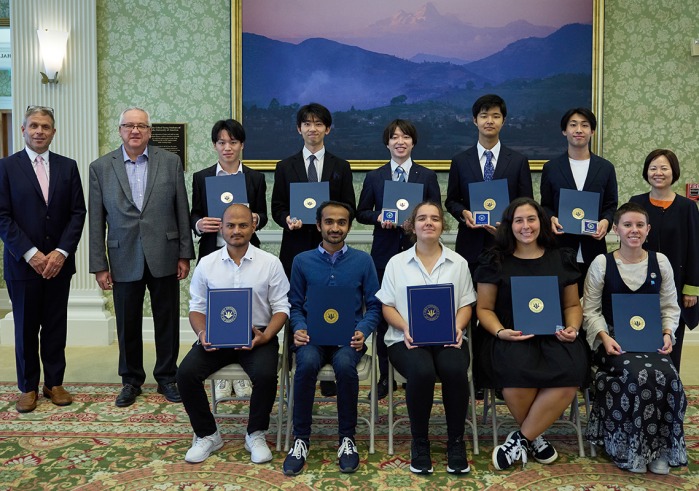 2023 scholarship awardees with university officials 