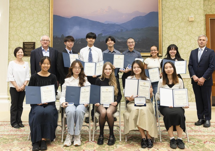 2025 Academic Award winning SUA students pose in Founders Hall with Dean of Students Hyon Moon, President Ed Feasel, and Dean of Faculty Robert Hamersley.