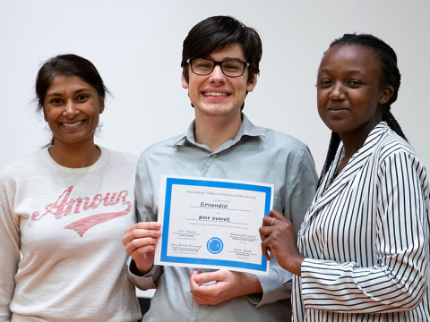 Lucas Caceres, Linda Mutesi, and Shaheen Sheik-Sadhal holding award