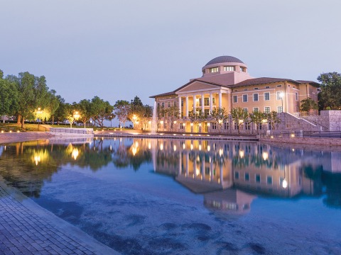 Overlooking Peace Lake at twilight with Founders Hall in the background