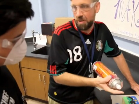 Teacher instructing student about creating a mini-mural