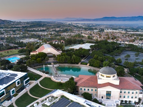 Aerial view of Soka University of America's campus at sunset