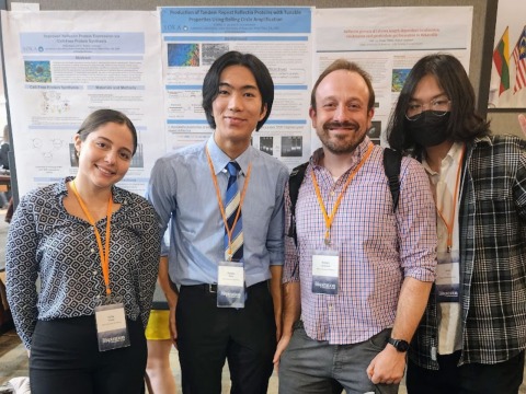Prof Robert Levenson poses with three Soka Undergraduates