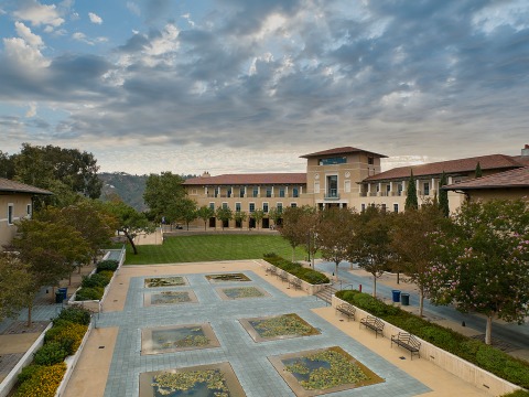 Aerial view of campus lily ponds with academic buildings in the background