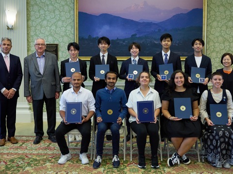 2023 scholarship awardees with university officials 