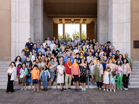 Alumni and their families pose for a commemorative photo of the 30th anniversary of the SUA Graduate School