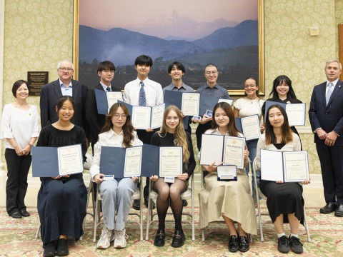 2025 Academic Award winning SUA students pose in Founders Hall with Dean of Students Hyon Moon, President Ed Feasel, and Dean of Faculty Robert Hamersley.