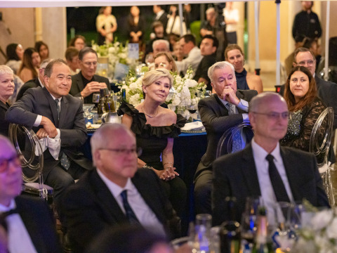 Gala attendees wearing formal attire listen intently during the 2026 Peace Gala on Soka's campus.