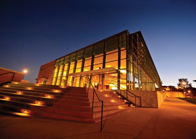 Exterior of Soka Performing Arts Center at twilight