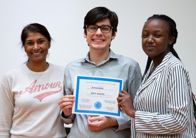 Lucas Caceres, Linda Mutesi, and Shaheen Sheik-Sadhal holding award