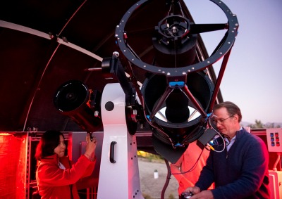 Student and professor operate telescope in Nieves Observatory