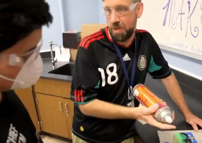 Teacher instructing student about creating a mini-mural 