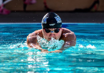 Swimmer, Yoshki Wurtz, is competing in the pool