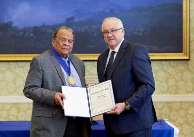 Ambassador Andrew Young accepts Soka Global Citizen Award from President Ed Feasel