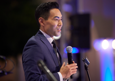 Master of Ceremonies Gene Kang speaks to the Gala attendees