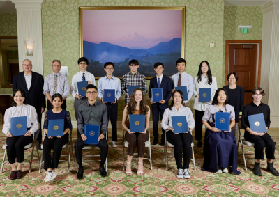 Recipients of Soka University of America’s top academic honors pose for a photo with their awards.