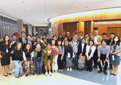 Soka students and faculty pose and smile