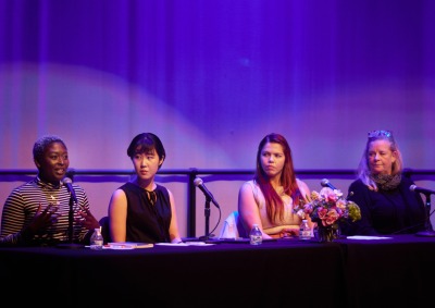 Anne Pearce, director of the creative arts program, Soka alumnus Giselle Velasquez ’15, Nappa Kataoka ’23, and Wilnie Merilien, resident hall coordinator sit on stage and speak during the “Voices of Women at Soka” event.