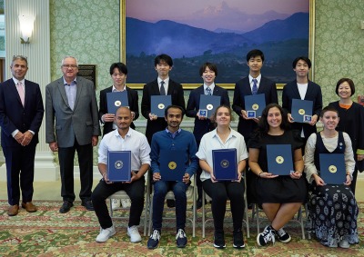 2023 scholarship awardees with university officials 