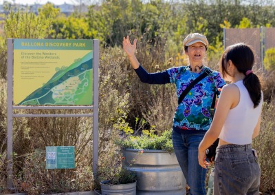 Deike Peters speaks to a student during a field trip to Ballona Discovery Park.