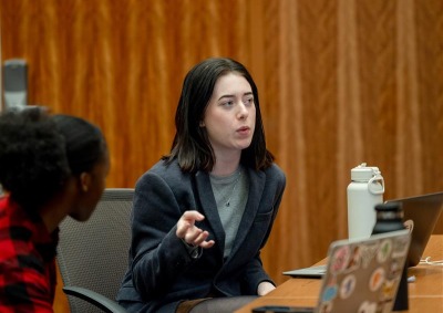 Carol Krein Robinson '25 speaks to fellow students during class at SUA.