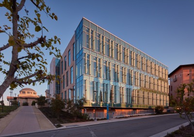 Sunlight reflects off Curie Hall on SUA's campus.