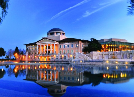 Founders Hall and Peace Lake calm and blue