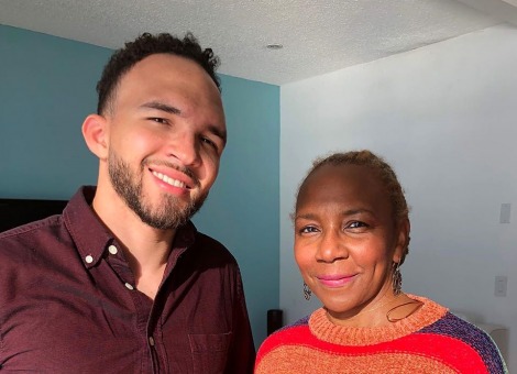 Man and Woman smiling at camera