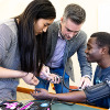 Students learning how to check blood pressure