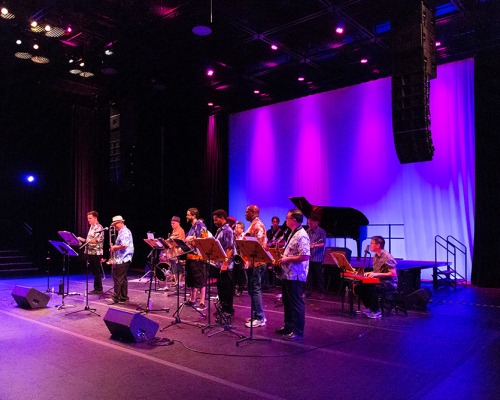 Performers on the Black Box Theatre stage 