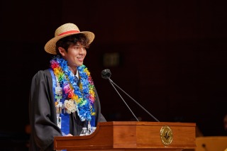 Student speaker gives a speech at 2022 Commencement