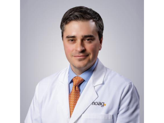 Headshot of Dr Khagi
